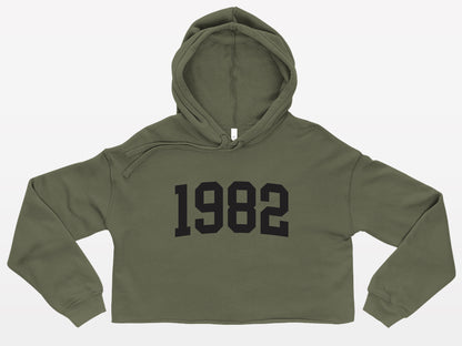 military green with black print birth year cropped hoodie 1982
