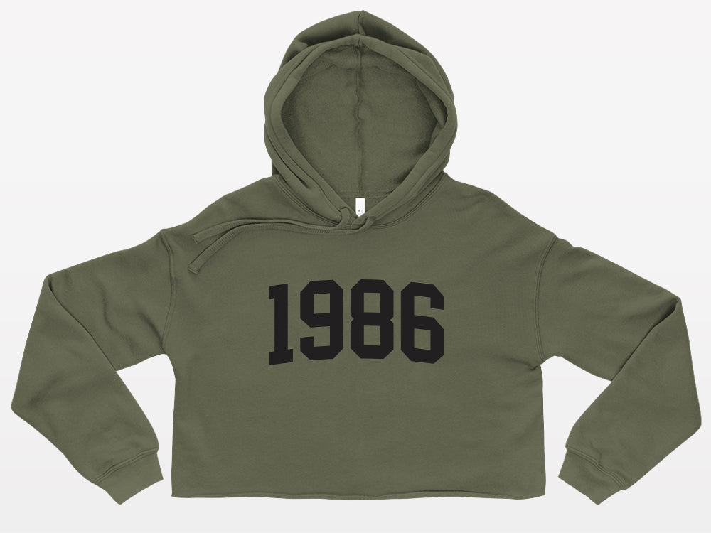 military green with black print birth year cropped hoodie 1986