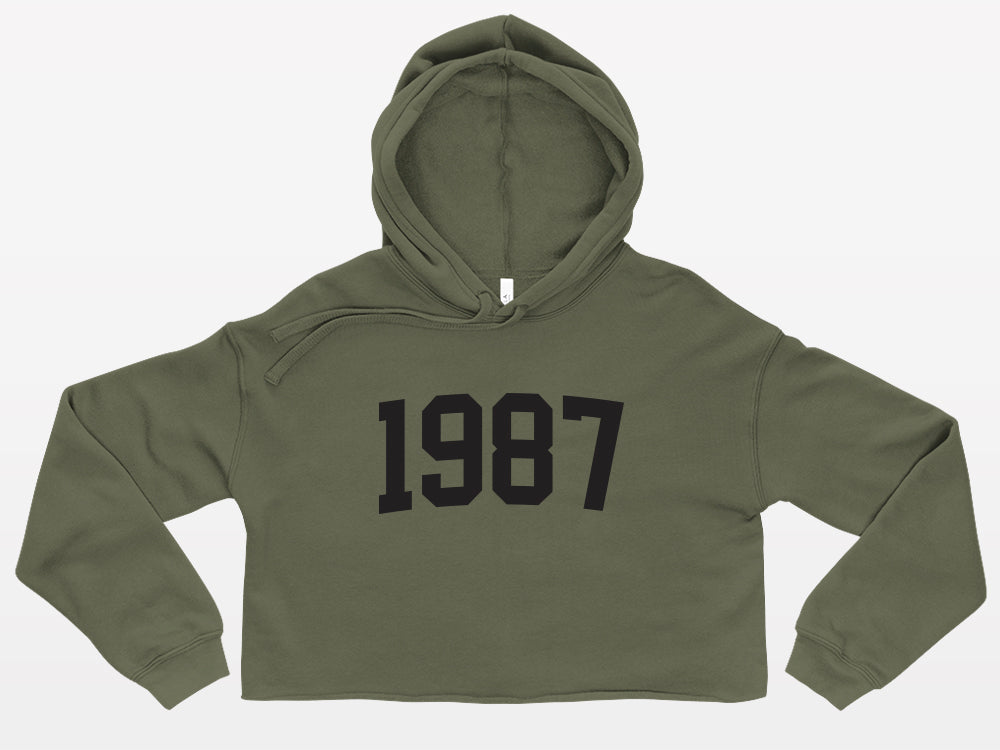 military green with black print birth year cropped hoodie 1987